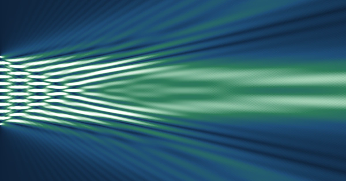 Light spreading from a multi-slit aperture as it propagates; on hover, the same field as the wavelength sweeps